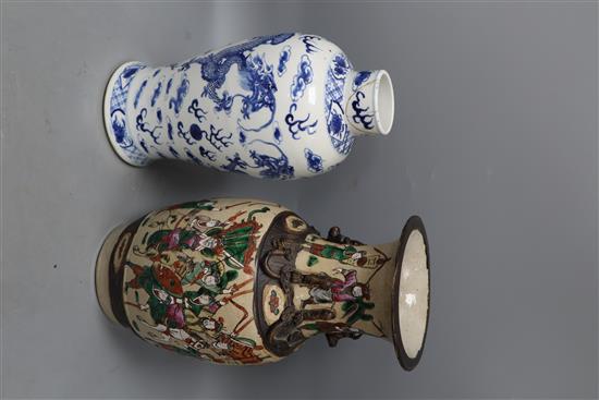 A Chinese famille rose crackle glaze vase and a Chinese blue and white dragon vase, tallest 34cm